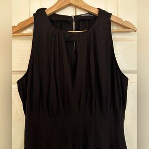 This is a brand new maxi knit (deep slit) black dress from eshakti.com.